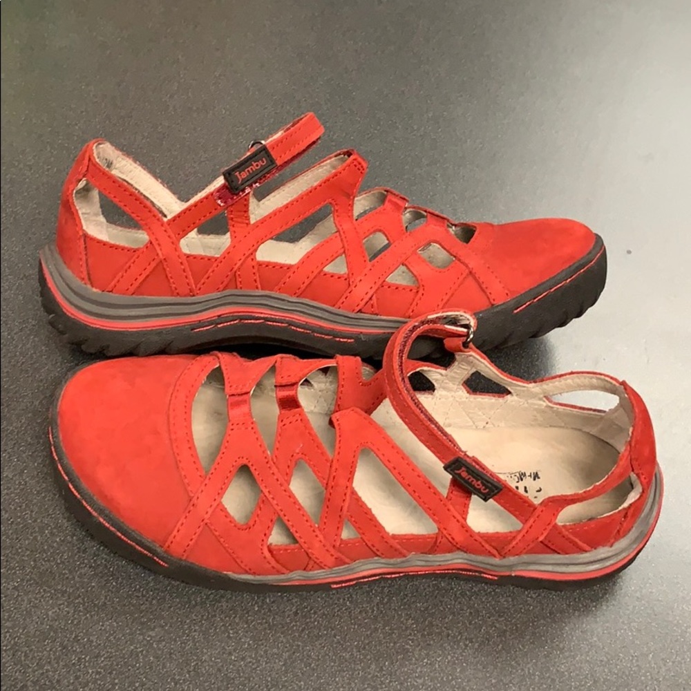 Red leather sandals.